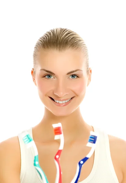 種類の歯ブラシと美しい若い女性 — ストック写真