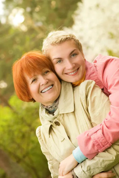 Mother and daughter having fun outdoors Royalty Free Stock Photos
