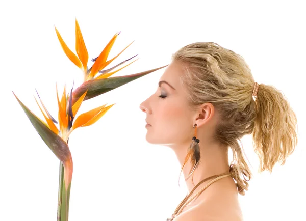 Beautiful woman with bird of paradise floser isolated on white b — Stock Photo, Image