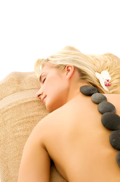 Massage mit heißen vulkanischen Steinen — Stockfoto