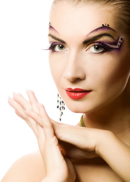 Mulher bonita com maquiagem criativa em seu rosto — Fotografia de Stock