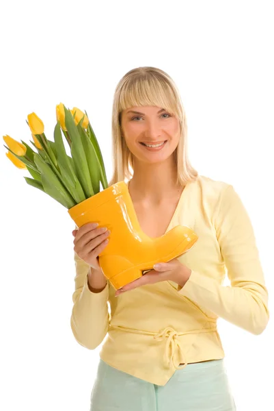 Beautiful young woman with fresh spring flowers isolated on whit — Stock Photo, Image