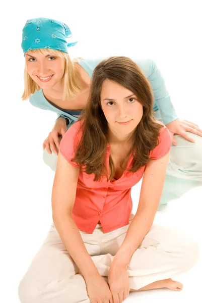 Two teenage girls isolated on white background — Zdjęcie stockowe