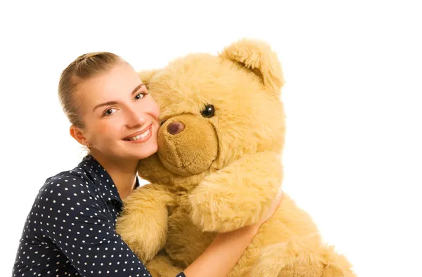 Stock image Beutiful young happy woman with big teddy bear toy