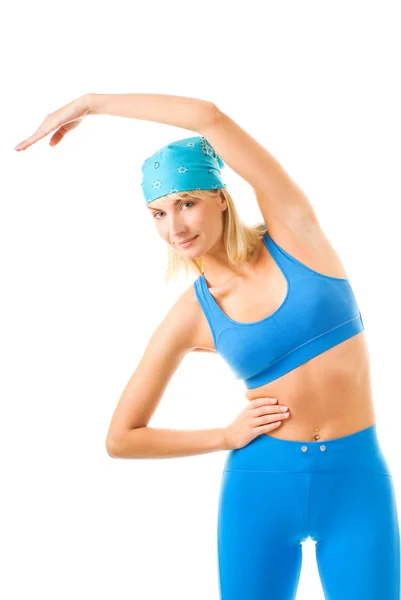 Vacker ung kvinna gör fitness motion isolerad på vita b — Stockfoto