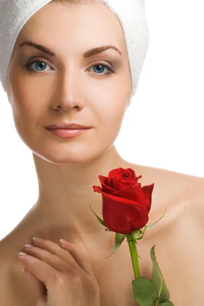 Beautiful young woman with red rose — Stock Photo, Image