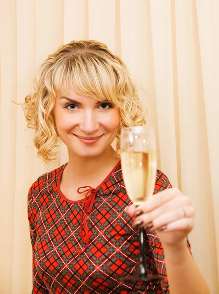 Beautiful girl with a glass of champagne — Stock Photo, Image