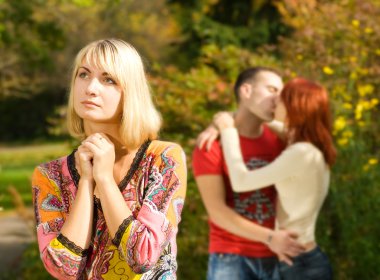 Dreaming girl and kissing couple on a background clipart