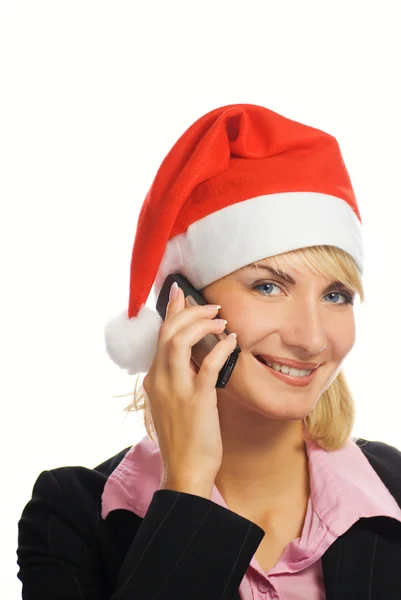 Business woman in Christmas hat talks on the phone. Isolated on — Stock Photo, Image