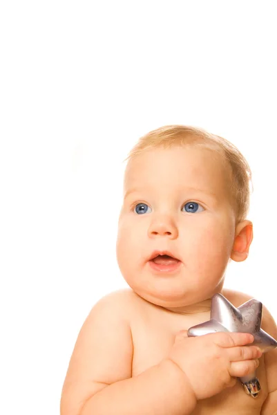 Bebê bonito com uma estrela de prata isolada no fundo branco — Fotografia de Stock