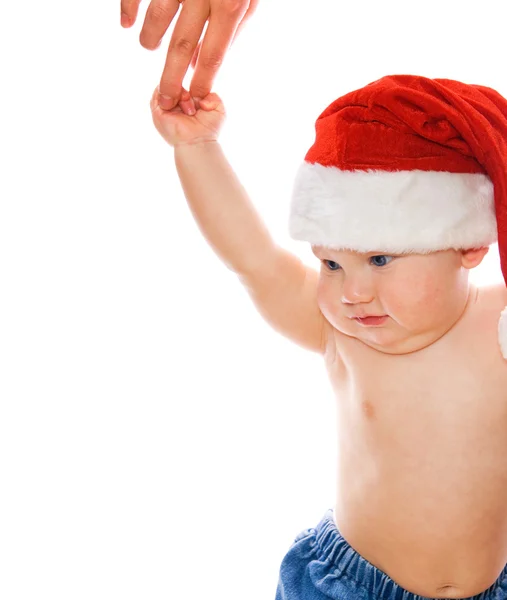 可爱的孩子在圣诞帽子握着母亲的手 — 图库照片