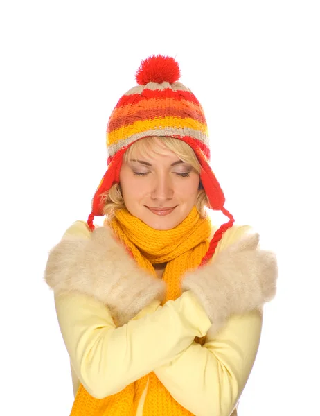Bevroren meisje in kleurrijke winter kleding op witte achtergrond — Stockfoto