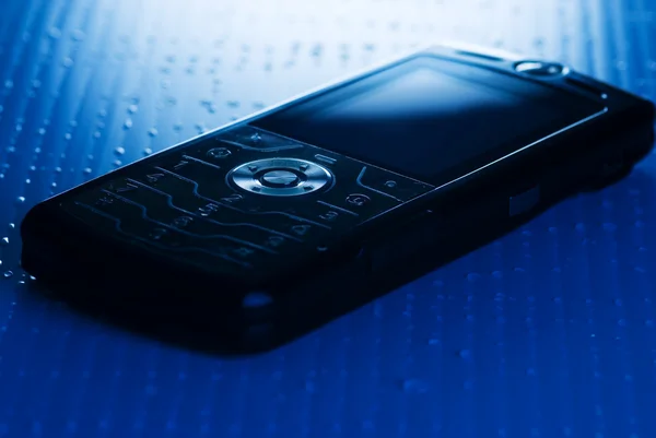 Bleu image tonique d'un téléphone mobile (peu profonde DoF, axée sur ro — Photo