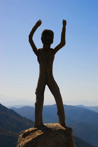 Homo sapiens sculpture in high mountains — Stock Photo, Image