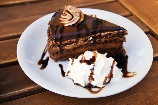 stock image Chocolate cake on a wooden table