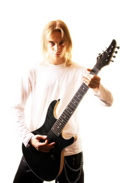 Young man with a guitar — Stock Photo, Image