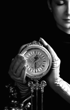 Monochrome picture of a beutiful girl with a clock (focus on clo clipart