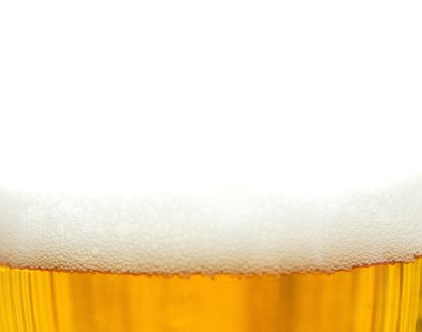 Fresh beer with foam over white background clipart