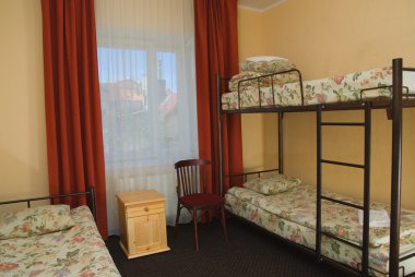Hostel room with city view clipart