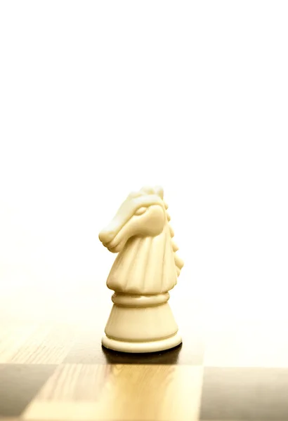 Knight figure on chessboard — Stock Photo, Image