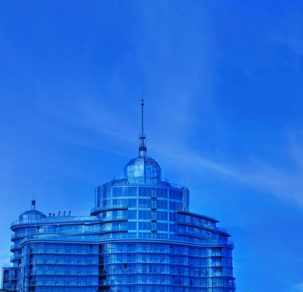 Urban office building over blue sky — Stock Photo, Image