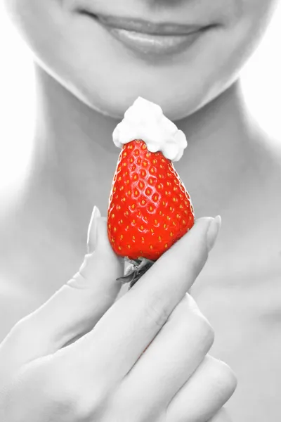 Girl with a fresh juicy strawberry — Stock Photo, Image