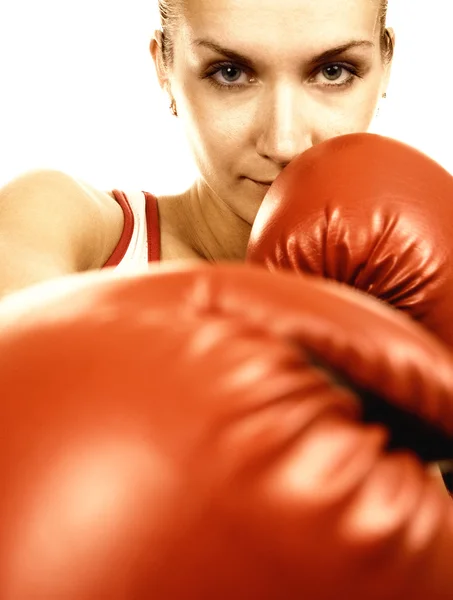 Sepia portrait of a girl in red boxing gloves — Stock Photo, Image