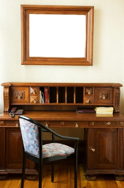 stock image Luxury cabinet with a frame of the wall (perfect place for text