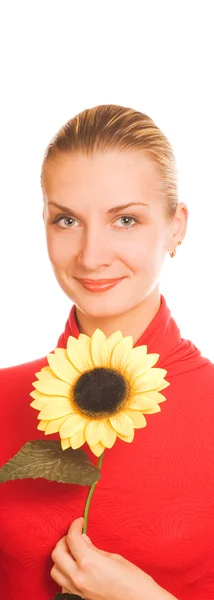 Schönes Mädchen mit einer Sonnenblume — Stockfoto