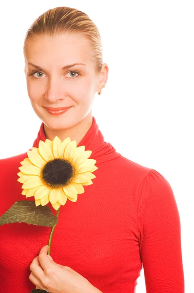Schönes Mädchen mit einer Sonnenblume — Stockfoto