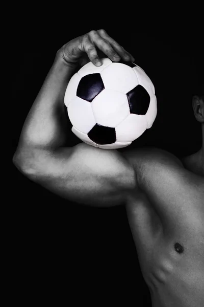 Muž držící míč — Stock fotografie