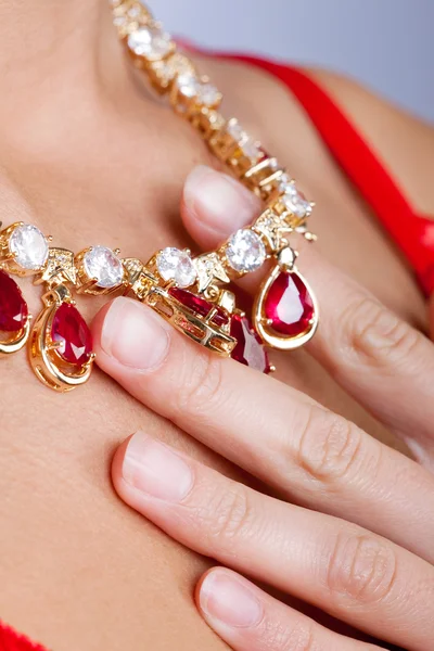 Hand touching necklace — Stock Photo, Image