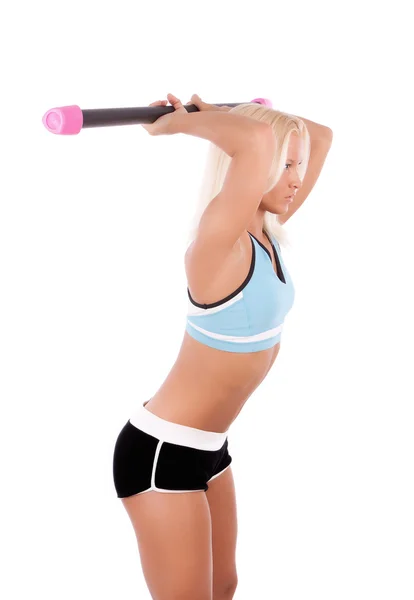 Mulher exercitando com barra de ajuste — Fotografia de Stock