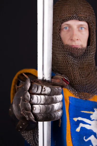 Sword in knights hand — Stock Photo, Image