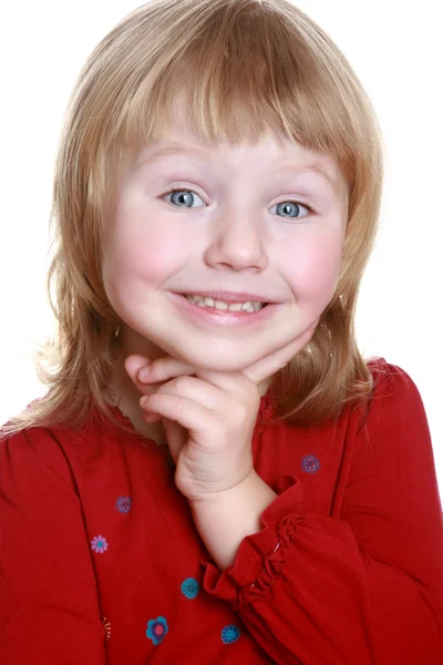 Kırmızı elbiseli mutlu küçük kız — Stok fotoğraf