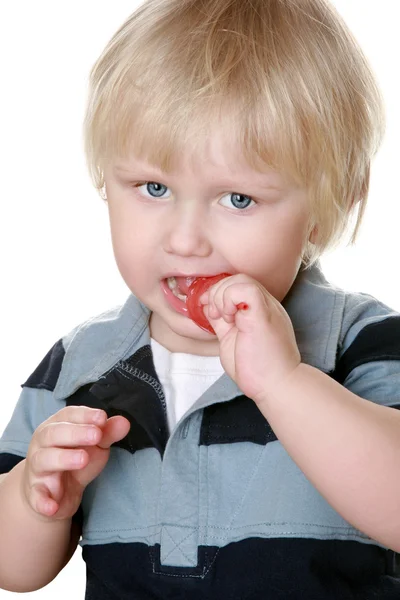 Beautiful boy with a sugar can — Stock Photo, Image