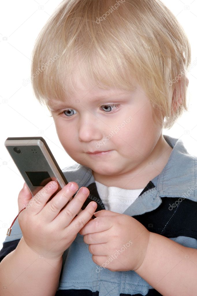 Young boy holding mobile phone — Stock Photo © 2921286