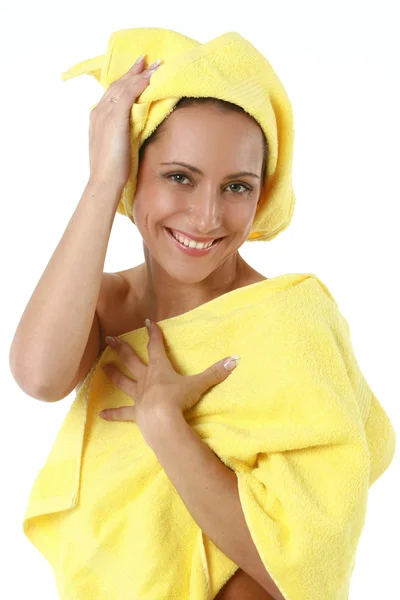 Girl with yellow towel — Stock Photo, Image