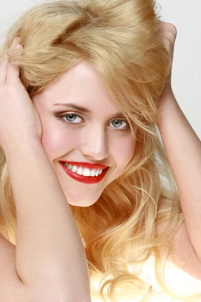 Lachende blonde — Stockfoto