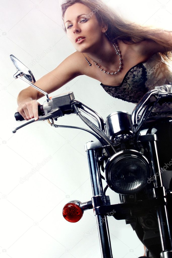 Beautiful girl on a motorbike.