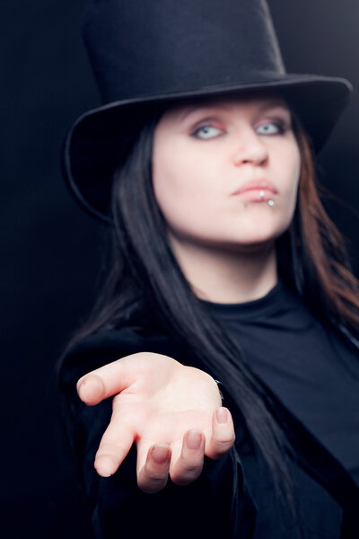 The Victorian sorcerer, the girl in the cylinder.