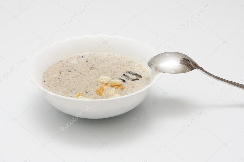 Creamy mushrooms soup with thyme
