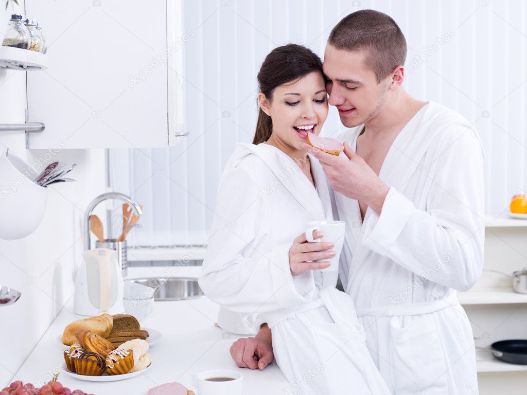 https://static4.depositphotos.com/1001992/315/i/950/depositphotos_3159539-stock-photo-happy-lovers-having-breakfast.jpg