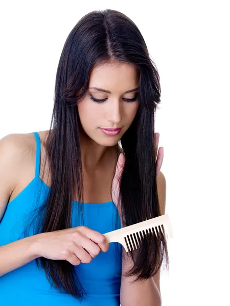 Rear View Of Girl Combing Hair — Stock Photo © Valuavitaly #3665144