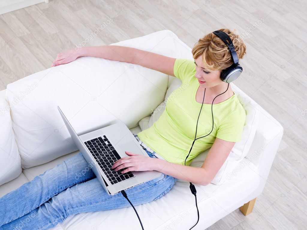 Woman In Headphones With Laptop — Stock Photo © Valuavitaly #3664306