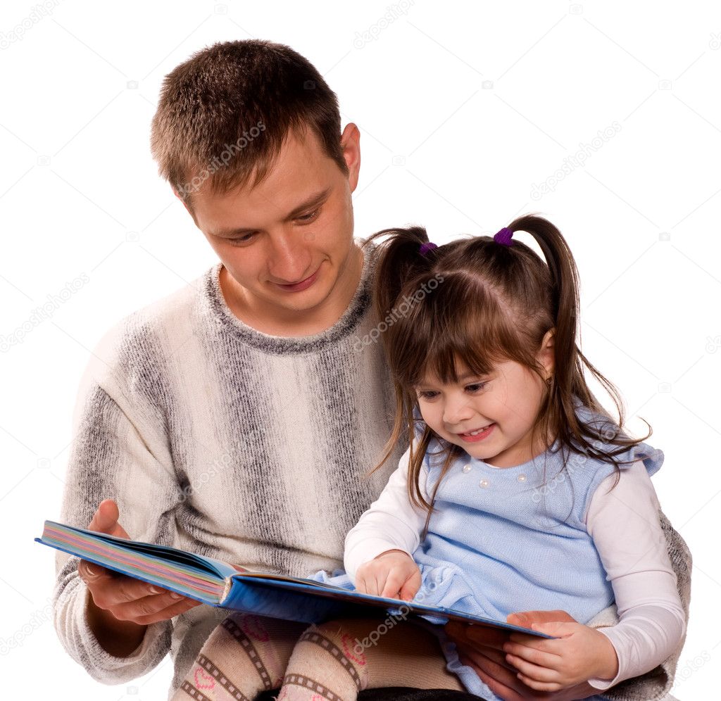 Happy family reading a book