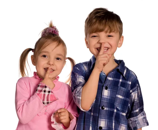 Смешные мальчик и девочка — стоковое фото