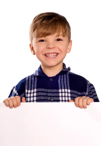 Niño sosteniendo un espacio en blanco —  Fotos de Stock