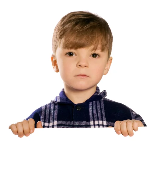 Boy holding a blank — Stock Photo, Image