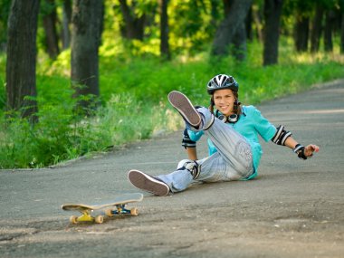 Teenage girl with skateboard clipart
